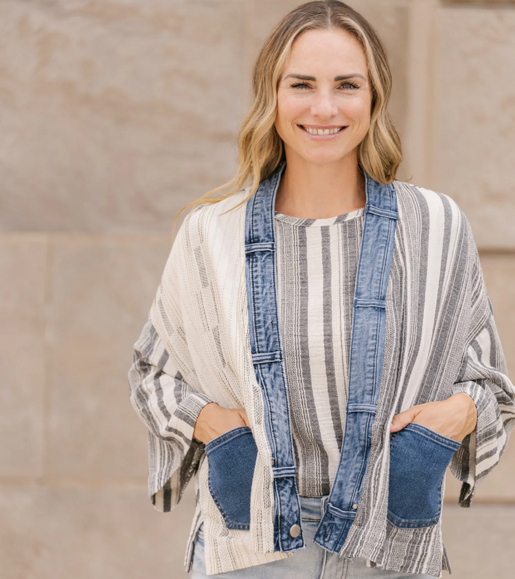 A woman with a warm and stylish jacket on. 